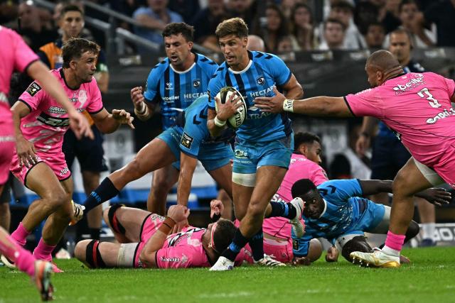 Montpellier’s Argentine fly-half Domingo Miotti attempts to break away during the French Top14 rugby union semi-final match between Montpellier Hйrault Rugby and Stade Franзais at the Velodrome stadium in Marseille, southern France, on June 20, 2026. (Photo by Gabriel BOUYS / AFP)