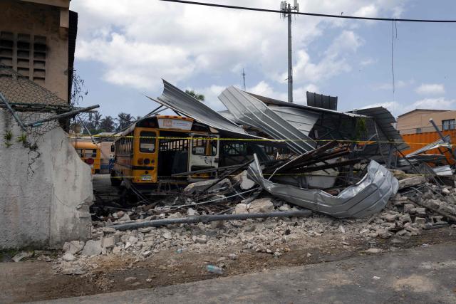 View of damaged structures and debris at the Viva Dominicus Beach hotel premises following a fire in Bayahibe, La Altagracia province, Dominican Republic, on July 20, 2026. An Italian tourist died on June 19 after inhaling smoke from a large fire at a hotel in the resort town of Bayahibe, southeastern Dominican Republic, an official told AFP. (Photo by Erickson Polanco / AFP)