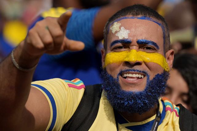 A Curacao fan cheers for his team ahead of the 2026 World Cup Group E football match between Ecuador and Curacao at the Kansas City Stadium in Kansas City on June 20, 2026.  (Photo by JUAN MABROMATA / AFP)