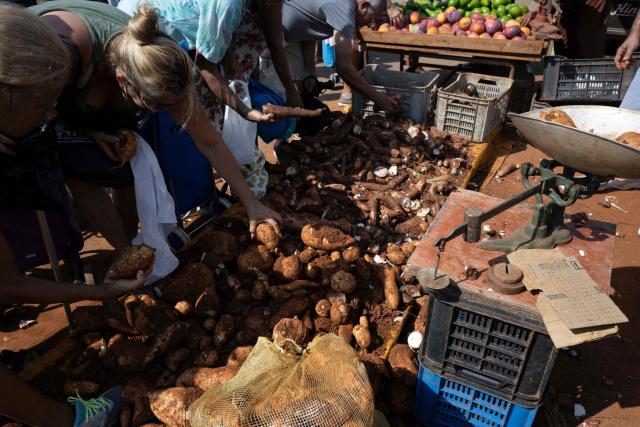 Residents purchase vegetables at a neighbourhood market in Playa municipality, Havana, on June 20, 2026. (Photo by Pablo PORCIUNCULA / AFP)