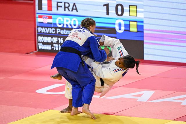 France's Kaila Issoufi (white) and Croatia's Petrunjela Pavic compete in the women's under 78kg preliminary bout at the Judo Ulaanbaatar Grand Slam 2026 in Ulaanbaatar on June 21, 2026. (Photo by ADEK BERRY / AFP)