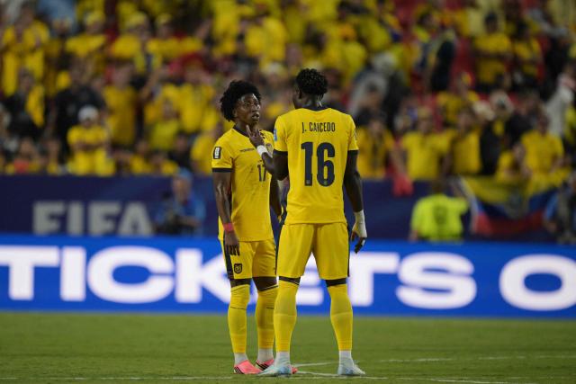 Ecuador's defender #17 Angelo Preciado and Ecuador's forward #16 Jordy Caicedo react at the end of the 2026 World Cup Group E football match between Ecuador and Curacao at the Kansas City Stadium in Kansas City on June 20, 2026.  (Photo by JUAN MABROMATA / AFP)
