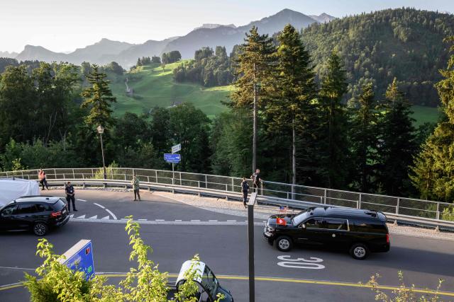 The motorcade transporting US Vice President JD Vance arrives at the Burgenstock luxury hotel complex overlooking Lake Lucerne, Switzerland, on June 21, 2026, ahead of high-level talks aimed at advancing a deal to end the Middle East conflict. A new round of negotiations over the Middle East war was set to kick off on June 21, 2026 with Iranian negotiators arriving in the Swiss host city hours ahead of US Vice President JD Vance, even as Tehran said it was closing the Strait of Hormuz again over Israeli attacks in Lebanon. (Photo by Fabrice COFFRINI / AFP)