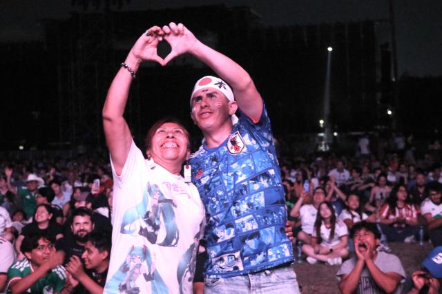 Football fans watch the 2026 World Cup Group F football match between Tunisia and Japan at a fan fest in Monterrey, Mexico, on June 20, 2026. (Photo by Julio Cesar SALAZAR / AFP)