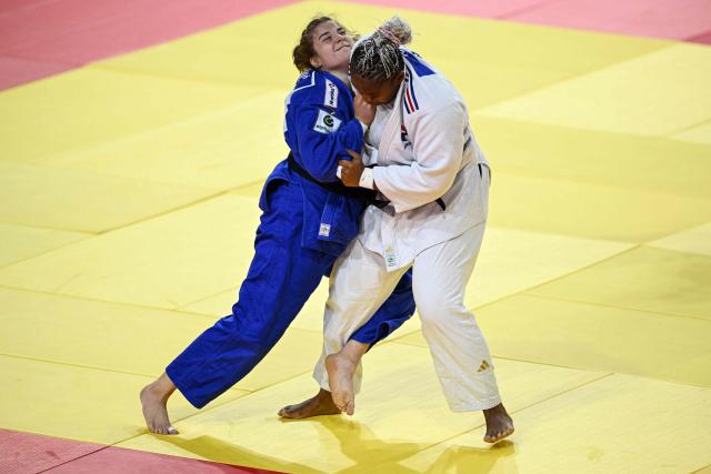 Romane Dicko of France (white) and Helena Vucovic of Croatia compete in their women’s +78 kg semifinal at the Judo Ulaanbaatar Grand Slam in Ulaanbaatar on June 21, 2026. (Photo by ADEK BERRY / AFP)