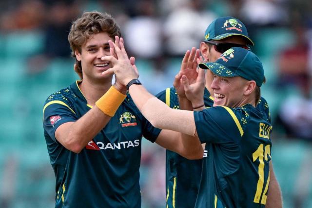 Australia's Spencer Johnson (L) celebrates with teammates after taking the wicket of Bangladesh's Saif Hassan during the third Twenty20 (T20) international cricket match between Bangladesh and Australia at the Bir Sreshtho Flight Lieutenant Matiur Rahman Stadium in Chattogram on June 21, 2026. (Photo by AFP)
