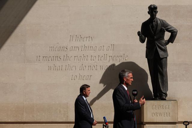 Britain's Business Secretary Peter Kyle (R) and Britain's main opposition Conservative Party Shadow Chancellor of the Exchequer, Mel Stride (L) speak to members of the media outside the BBC in central London on June 21, 2026, after appearing on the BBC's 'Sunday' political television show, amid reports that Britain's Prime Minister Keir Starmer is planning to announce his resignation. (Photo by Adrian Dennis / AFP)