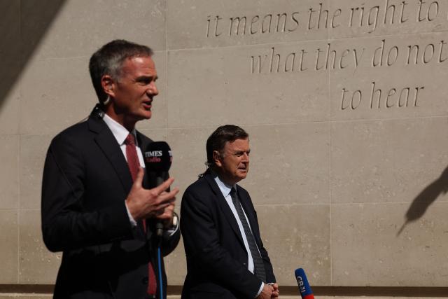 Britain's Business Secretary Peter Kyle (L) and Britain's main opposition Conservative Party Shadow Chancellor of the Exchequer, Mel Stride  (R) speak to members of the media outside the BBC in central London on June 21, 2026, after appearing on the BBC's 'Sunday' political television show, amid reports that Britain's Prime Minister Keir Starmer is planning to announce his resignation. (Photo by Adrian Dennis / AFP)