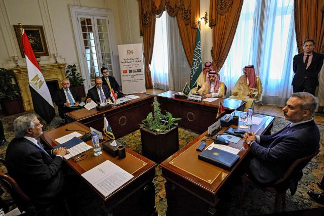 From (L-R) Pakistan's Foreign Minister Ishaq Dar, Egypt's Foreign Minister Badr Abdel Ati, Saudi Foreign Minister Faisal bin Farhan and Turkey's Foreign Minister Hakan fidan,  attend a meeting in Cairo on June 21, 2026. Pakistan's foreign ministry said on June 19 that the four-way meeting would bring together the foreign ministers of Pakistan, Saudi Arabia, Turkey and Egypt to "discuss regional developments and exchange views on issues related to peace, security and stability". (Photo by Khaled DESOUKI / AFP)