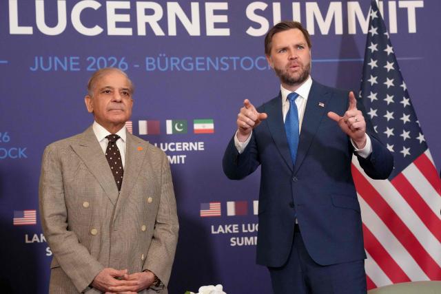 US Vice President JD Vance (R) meets with Pakistan's Prime Minister Shehbaz Sharif at the Burgenstock luxury hotel complex overlooking Lake Lucerne, Switzerland, on June 21, 2026, ahead of high-level talks aimed at advancing a deal to end the Middle East conflict. A new round of negotiations over the Middle East war was set to kick off on June 21, 2026 with Iranian negotiators arriving in the Swiss host city hours ahead of US Vice President JD Vance, even as Tehran said it was closing the Strait of Hormuz again over Israeli attacks in Lebanon. (Photo by Nathan Howard / POOL / AFP)