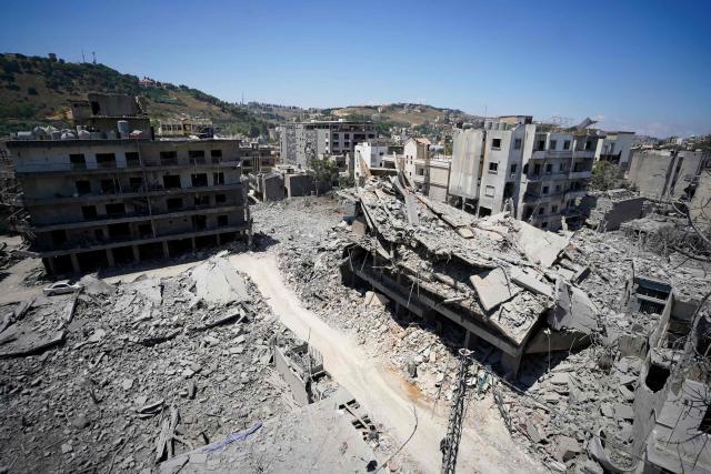 This picture shows heavily damaged buildings at the site of Lebanon's central bank building that was targeted in an Isreali strike the previous day in the southern Lebanese city of Nabatieh on June 21, 2026. (Photo by Abbas FAKIH / AFP) / 