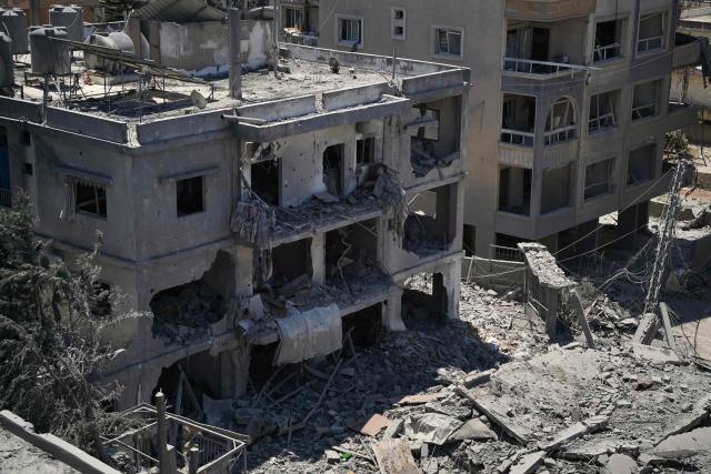 This picture shows heavily damaged buildings at the site of Lebanon's central bank building that was targeted in an Isreali strike the previous day in the southern Lebanese city of Nabatieh on June 21, 2026. (Photo by Abbas FAKIH / AFP) / 