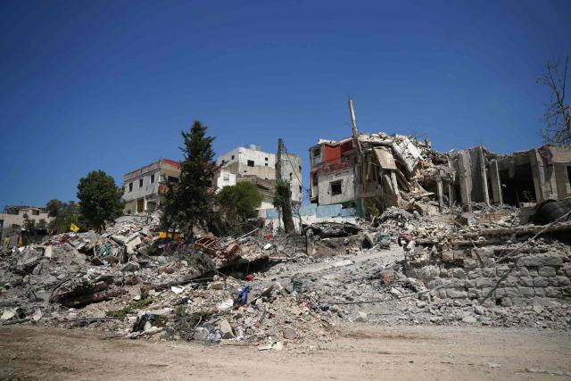 This picture shows heavily damaged buildings at the site of Lebanon's central bank building that was targeted in an Isreali strike the previous day in the southern Lebanese city of Nabatieh on June 21, 2026. (Photo by Abbas FAKIH / AFP) / 