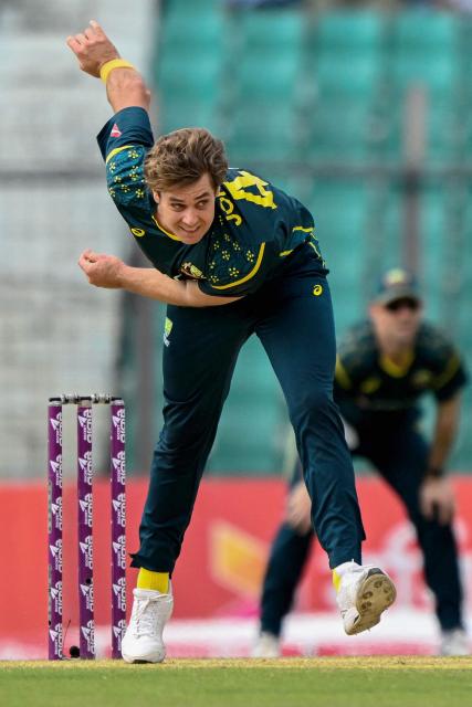 Australia's Spencer Johnson delivers a ball during the third Twenty20 (T20) international cricket match between Bangladesh and Australia at the Bir Sreshtho Flight Lieutenant Matiur Rahman Stadium in Chattogram on June 21, 2026. (Photo by AFP)
