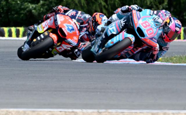 Team MT Helmets - MSi's Ivan Ortola (L) races to win the Moto2 event in front of Team CFMoto Aspar Racing Team's David Alonso (R) prior to the MotoGP Grand Prix of Czechia in Brno, Czech Republic, on June 21, 2026. (Photo by Michal Cizek / AFP)
