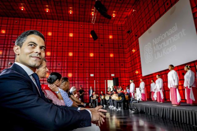 Netherlands' Prime Minister Rob Jetten looks on ahead of the unveiling of a national monument at the Lloydkade for Moluccans during the commemoration of the Moluccan community that arrived there 75 years ago. In 1946, the first Moluccan men came to the Netherlands for training with the Royal Netherlands Navy, after which they served in active service in Amsterdam, as well as in Indonesia and other parts of the Kingdom. (Photo by Robin Utrecht / ANP / AFP) / Netherlands OUT