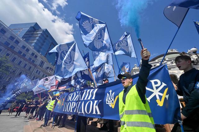 Far right demonstrators take part in a counter-rally against the Kyiv Pride March 2026 and in defense of "traditional values" in Kyiv on June 21, 2026, amid Russian invasion in Ukraine. (Photo by Sergei SUPINSKY / AFP)