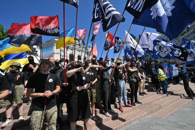 Far right demonstrators take part in a counter-rally against the Kyiv Pride March 2026 and in defense of "traditional values" in Kyiv on June 21, 2026, amid Russian invasion in Ukraine. (Photo by Sergei SUPINSKY / AFP)