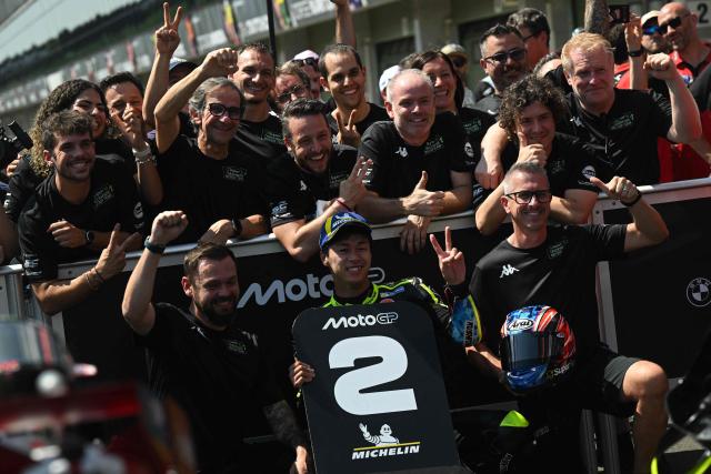 Team Trackhouse Racing MotoGP's Ai Ogura (C) celebrates with team members after placing second in the MotoGP Grand Prix of Czechia in Brno, Czech Republic, on June 21, 2026. (Photo by Michal Cizek / AFP)