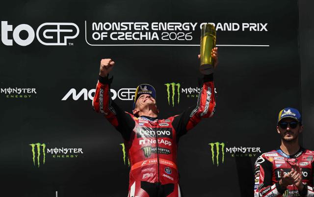 Team Ducati Lenovo Team's Marc Marquez celebrates on the podium after winning the MotoGP Grand Prix of Czechia in Brno, Czech Republic, on June 21, 2026. (Photo by Michal Cizek / AFP)