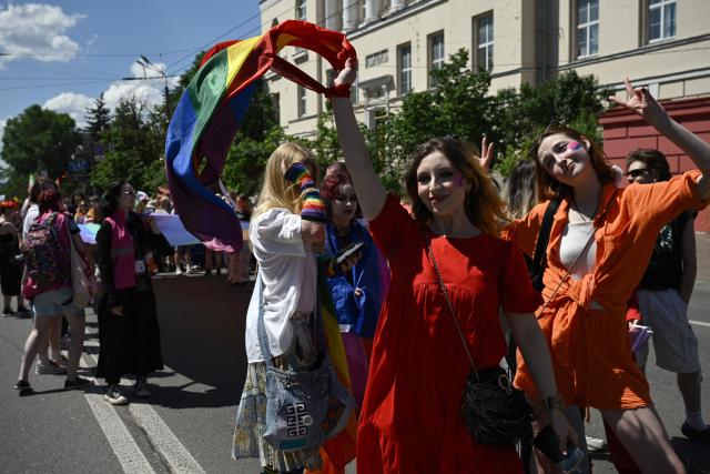 Demonstrators take part in the Kyiv Pride Equality March, a rally in support of the rights of LGBTQ+ community members, in Kyiv on June 21, 2026, amid the Russian invasion of Ukraine. (Photo by Genya SAVILOV / AFP)