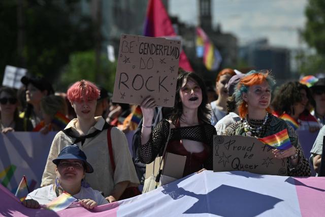 Demonstrators take part in the Kyiv Pride Equality March, a rally in support of the rights of LGBTQ+ community members, in Kyiv on June 21, 2026, amid the Russian invasion of Ukraine. (Photo by Genya SAVILOV / AFP)