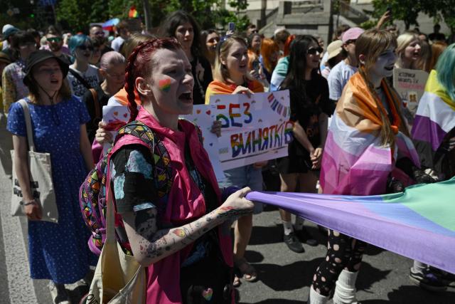 Demonstrators take part in the Kyiv Pride Equality March, a rally in support of the rights of LGBTQ+ community members, in Kyiv on June 21, 2026, amid the Russian invasion of Ukraine. (Photo by Genya SAVILOV / AFP)
