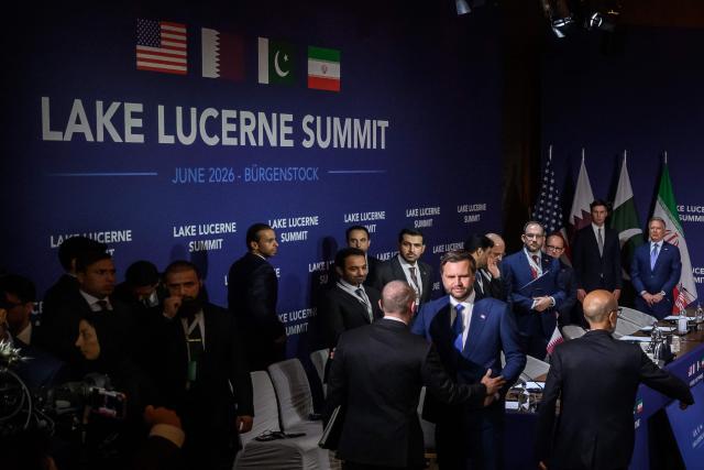 US Vice President JD Vance (C-R) stands prior to a quadrilateral meeting between the United States, Iran, Pakistan and Qatar at the Burgenstock luxury hotel complex overlooking Lake Lucerne, Switzerland, on June 21, 2026, as part of high-level talks aimed at advancing a deal to end the Middle East conflict. A new round of negotiations over the Middle East war was set to kick off on June 21, 2026 with Iranian negotiators arriving in the Swiss host city hours ahead of US Vice President JD Vance, even as Tehran said it was closing the Strait of Hormuz again over Israeli attacks in Lebanon. (Photo by Fabrice COFFRINI / POOL / AFP)