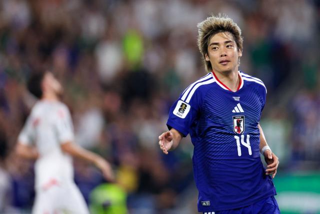 Japan's midfielder #14 Junya Ito celebrates after scoring his team third goal during the 2026 World Cup Group F football match between Tunisia and Japan at the Monterrey Stadium in Guadalupe, Mexico, on June 20, 2026.  (Photo by Julio Cesar AGUILAR / AFP)