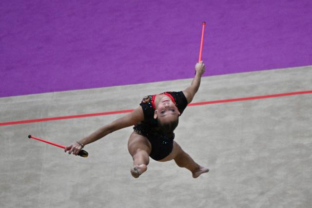 Russia's Sofiia Ilteriakova competes in the individual clubs of the 2026 Rhythmic Gymnastics World Challenge Cup in Beijing on June 21, 2026. (Photo by Pedro PARDO / AFP)