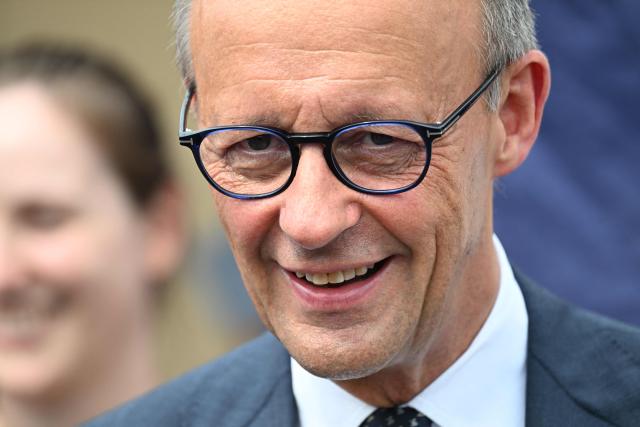 German Chancellor Friedrich Merz attends an event to mark the National Veterans' Day on June 21, 2026 in Berlin. The achievements of serving and former soldiers of the German armed forces (Bundeswehr) is honoured through events held across the country and a central celebration in Berlin. (Photo by RALF HIRSCHBERGER / AFP)
