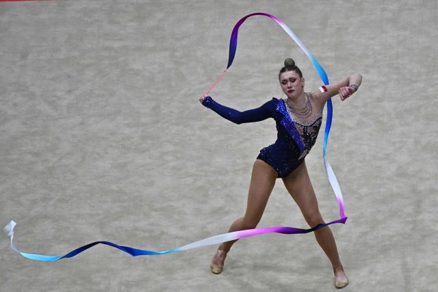 Poland's Liliana Lewinska competes in the individual ribbon of the 2026 Rhythmic Gymnastics World Challenge Cup in Beijing on June 21, 2026. (Photo by Pedro PARDO / AFP)