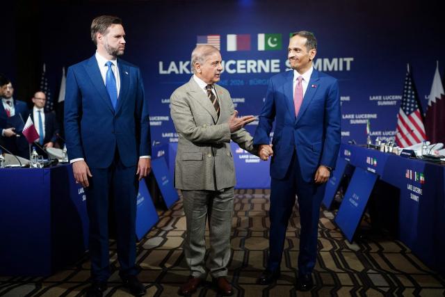 Pakistan's Prime Minister Shehbaz Sharif (C) speaks next to US Vice President JD Vance (L) and Qatar's Prime Minister Sheikh Mohammed bin Abdulrahman bin Jassim al-Thani prior to a quadrilateral meeting between the United States, Iran, Pakistan and Qatar at the Burgenstock luxury hotel complex overlooking Lake Lucerne, Switzerland, on June 21, 2026, as part of high-level talks aimed at advancing a deal to end the Middle East conflict. A new round of negotiations over the Middle East war was set to kick off on June 21, 2026 with Iranian negotiators arriving in the Swiss host city hours ahead of US Vice President JD Vance, even as Tehran said it was closing the Strait of Hormuz again over Israeli attacks in Lebanon. (Photo by Nathan Howard / POOL / AFP)