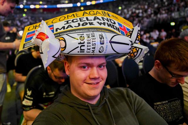 A supporter from Iceland smiles during the grand final between FURIA Esports und Team Falcons of the IEM Cologne Major 2026 Counter Strike tournament at the Lanxess Arena in Cologne, western Germany on June 21, 2026. (Photo by Ina FASSBENDER / AFP)