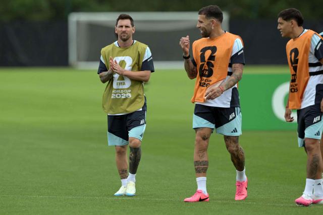 Argentina's forward #10 Lionel Messi (L) speaks with Argentina's defender #19 Nicolas Otamendi (2ndR) during an MD-1 training session at the Sporting KC Training Centre in Kansas City on June 21, 2026, on the eve of the 2026 World Cup Group J football match between Argentina and Austria.  (Photo by JUAN MABROMATA / AFP)