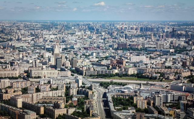 A general view taken on June 21, 2026 shows central-western Moscow from the observation deck of the OKO skyscraper. The "Only Love is Higher" observation deck is the highest open-air observation deck in Europe with a location on the rooftop of the OKO skyscraper of the Moscow International Business Centre (Moskva City), 354 meters (1162 feet) above the ground, 92nd floor. The deck is completely open and offers 360-degree views. (Photo by Alexander NEMENOV / AFP)