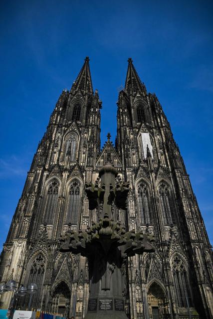 A photo shows the Cologne cathedral, western Germany on June 21, 2026. From July 1, 2026 tourists will only be able to enter the interior of Cologne Cathedral after purchasing a ticket. Attendance at church services will remain free of charge without restriction. (Photo by Ina FASSBENDER / AFP)