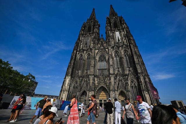 A photo shows the Cologne cathedral, western Germany on June 21, 2026. From July 1, 2026 tourists will only be able to enter the interior of Cologne Cathedral after purchasing a ticket. Attendance at church services will remain free of charge without restriction. (Photo by Ina FASSBENDER / AFP)