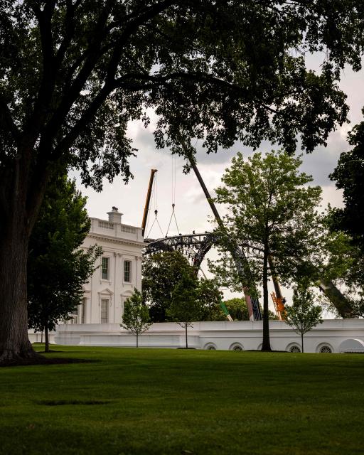 Workers disassemble The Claw from the UFC Freedom 250 fight on the South Lawn of the White House, in Washington, DC on June 21, 2026. (Photo by Kent Nishimura / AFP)