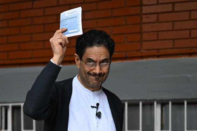 Colombia's presidential candidate for the ruling Pacto Historico party, Ivan Cepeda, votes at a polling station during the presidential election runoff, in Bogota on June 21, 2026. Colombians head to the polls to pick a new president between a hard-right White House-backed lawyer and a leftist senator that will decide the fate of the country's stumbling peace process and strained ties with Washington. (Photo by Raul ARBOLEDA / AFP)