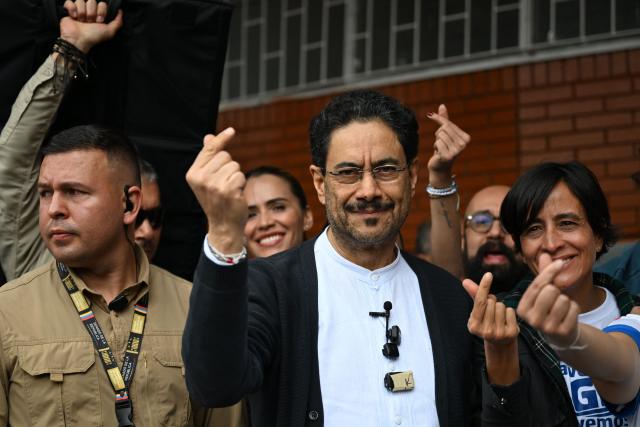 Colombia's presidential candidate for the ruling Pacto Historico party, Ivan Cepeda, gestures at a polling station during the presidential election runoff, in Bogota on June 21, 2026. Colombians head to the polls to pick a new president between a hard-right White House-backed lawyer and a leftist senator that will decide the fate of the country's stumbling peace process and strained ties with Washington. (Photo by Raul ARBOLEDA / AFP)