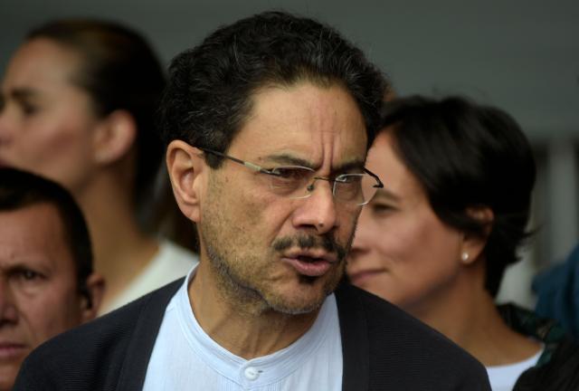 Colombia's presidential candidate for the ruling Pacto Historico party, Ivan Cepeda, gestures at a polling station during the presidential election runoff, in Bogota on June 21, 2026. Colombians head to the polls to pick a new president between a hard-right White House-backed lawyer and a leftist senator that will decide the fate of the country's stumbling peace process and strained ties with Washington. (Photo by Sebastian BARROS / AFP)
