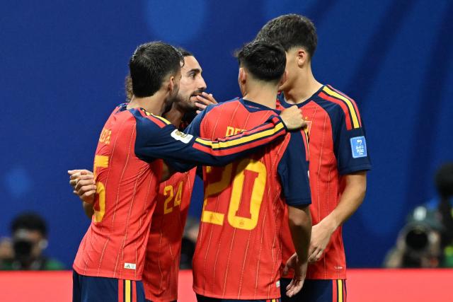 Spain's defender #24 Marc Cucurella (2nd L) celebrates with teammates after scoring his team's fourth goal during the 2026 World Cup Group H football match between Spain and Saudi Arabia at the Atlanta Stadium in Atlanta on June 21, 2026.  (Photo by ROBERTO SCHMIDT / AFP)