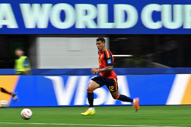 Spain's defender #12 Pedro Porro runs with the ball  during the 2026 World Cup Group H football match between Spain and Saudi Arabia at the Atlanta Stadium in Atlanta on June 21, 2026.  (Photo by ROBERTO SCHMIDT / AFP)