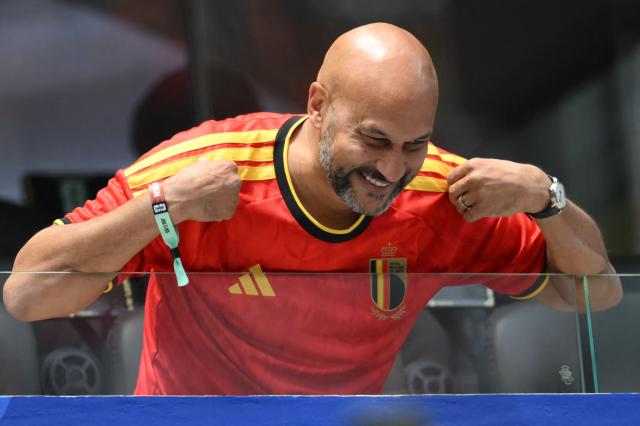 US actor Keegan-Michael Key wearing a Belgian national football team jersey gestures ahead of the 2026 World Cup Group G football match between Belgium and Iran at the Los Angeles Stadium in Inglewood on June 21, 2026.  (Photo by Patrick T. Fallon / AFP)