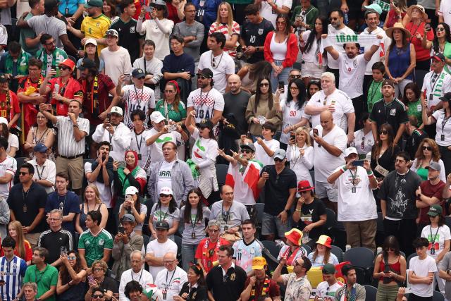 Iranian fans cheer for their team ahead of the 2026 World Cup Group G football match between Belgium and Iran at the Los Angeles Stadium in Inglewood on June 21, 2026.  (Photo by Etienne Laurent / AFP)