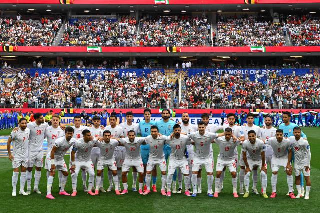 Iran's players pose for a picture ahead of the 2026 World Cup Group G football match between Belgium and Iran at the Los Angeles Stadium in Inglewood on June 21, 2026.  (Photo by Patrick T. Fallon / AFP)
