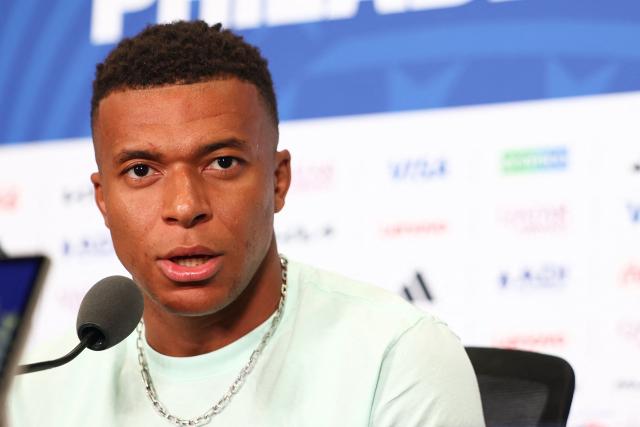 France's forward #10 Kylian Mbappe gives an MD-1 press conference at the Philadelphia Stadium in Philadelphia on June 21, 2026, on the eve of the 2026 World Cup Group I football match between France and Iraq.  (Photo by Franck FIFE / AFP)