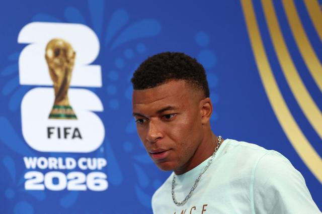 France's forward #10 Kylian Mbappe arrives at an MD-1 press conference at the Philadelphia Stadium in Philadelphia on June 21, 2026, on the eve of the 2026 World Cup Group I football match between France and Iraq.  (Photo by Franck FIFE / AFP)