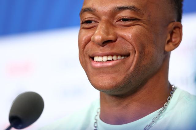 France's forward #10 Kylian Mbappe gives an MD-1 press conference at the Philadelphia Stadium in Philadelphia on June 21, 2026, on the eve of the 2026 World Cup Group I football match between France and Iraq.  (Photo by Franck FIFE / AFP)